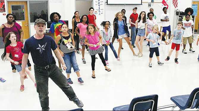 IMG 6076-artistic-director-Joey-Fargar-leads-the-campers-in-choreography